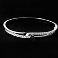 Timeless Love Sterling Silver Heart Bangle with Sparkling Stone Finish
