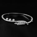 Graceful Feather Sterling Silver Bangle with Sparkling Stone Accents