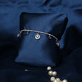 Celestial Spark Sterling Silver Charm Bracelet with Blue Stone Accents