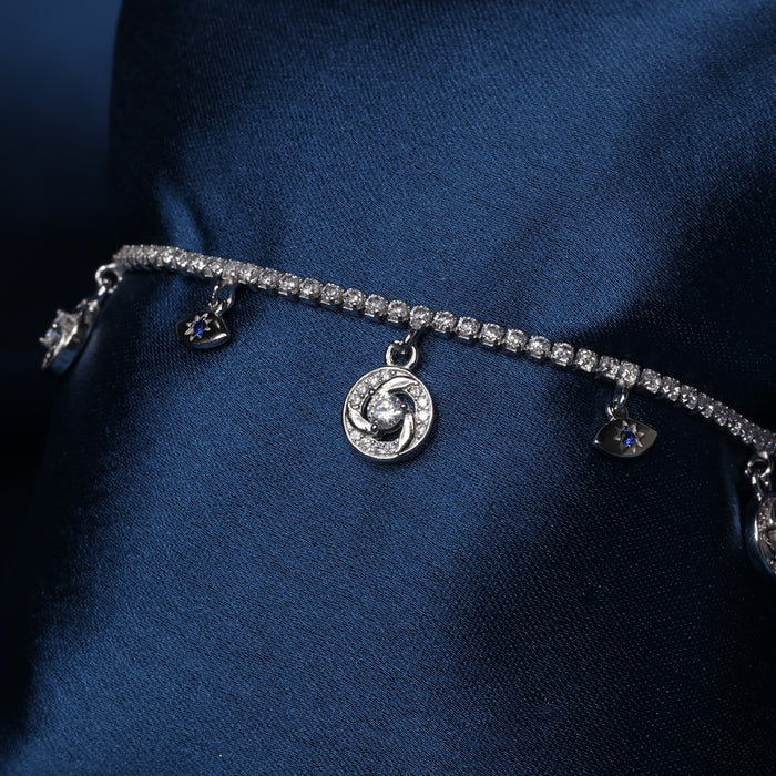 Celestial Spark Sterling Silver Charm Bracelet with Blue Stone Accents