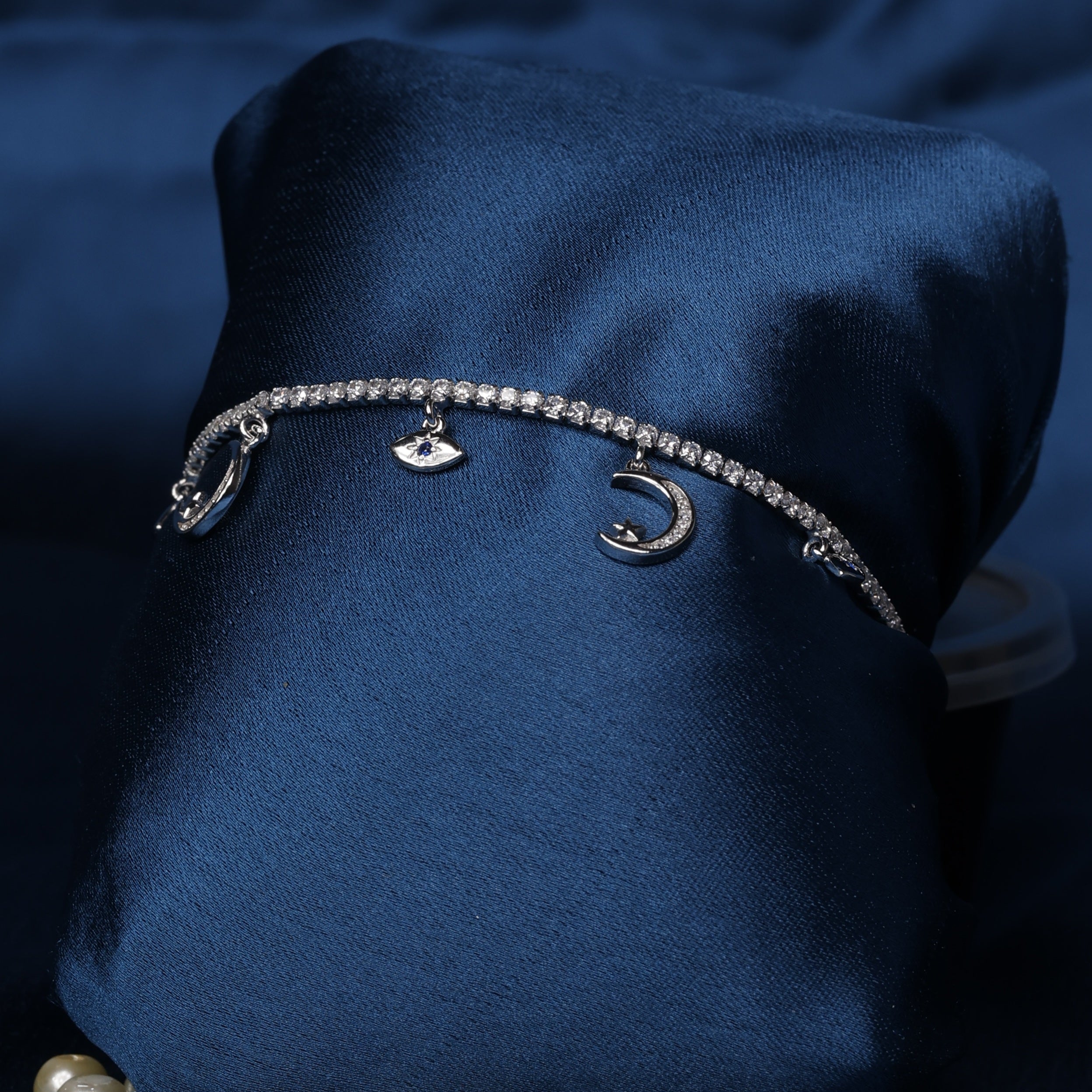 Moon & Evil Eye Sterling Silver Charm Bracelet with Subtle Blue Accents