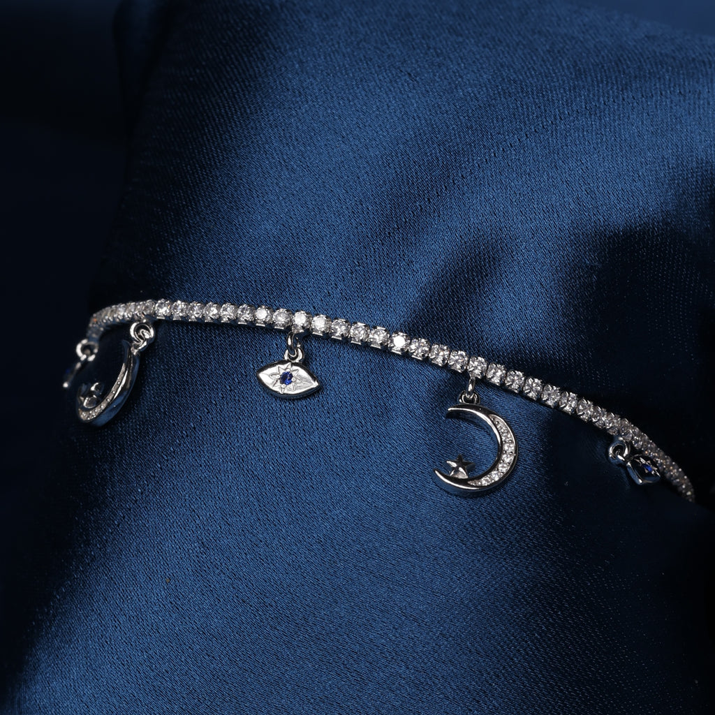 Moon & Evil Eye Sterling Silver Charm Bracelet with Subtle Blue Accents