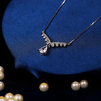 Feathered Grace Drop Pendant