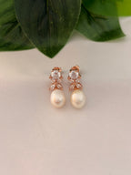 Elegant Pearl Drop Earrings with Crystal Floral Detailing