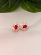 Elegant Ruby Halo Stud Earrings in Rose Gold