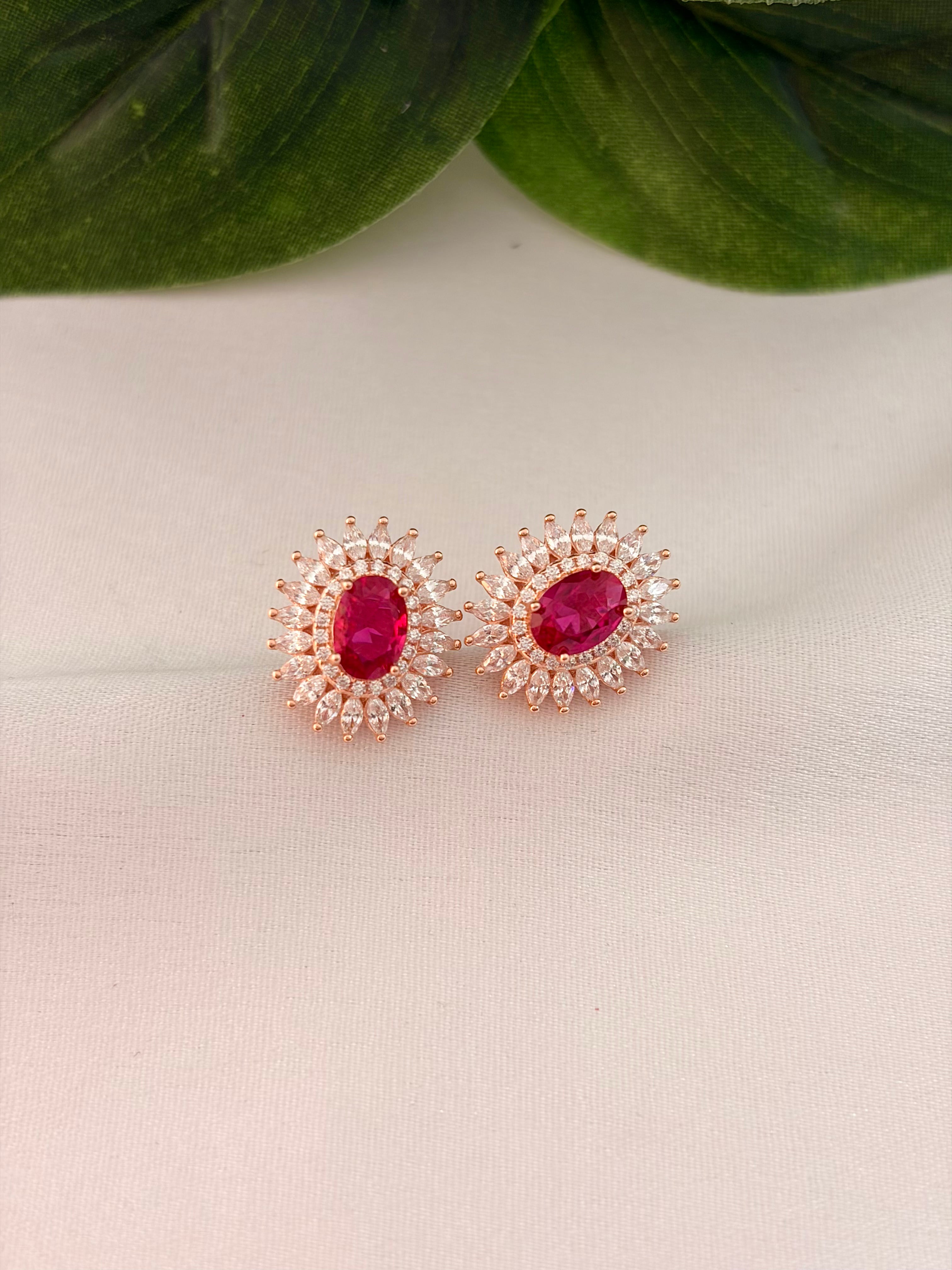 Elegant Ruby Halo Stud Earrings in Rose Gold