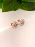 Radiant Blue Crystal Burst Stud Earrings in Rose Gold Tone