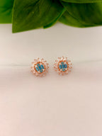 Radiant Blue Crystal Burst Stud Earrings in Rose Gold Tone
