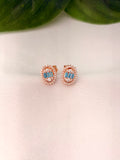 Elegant Blue Baguette Oval Halo Stud Earrings in Rose Gold Tone