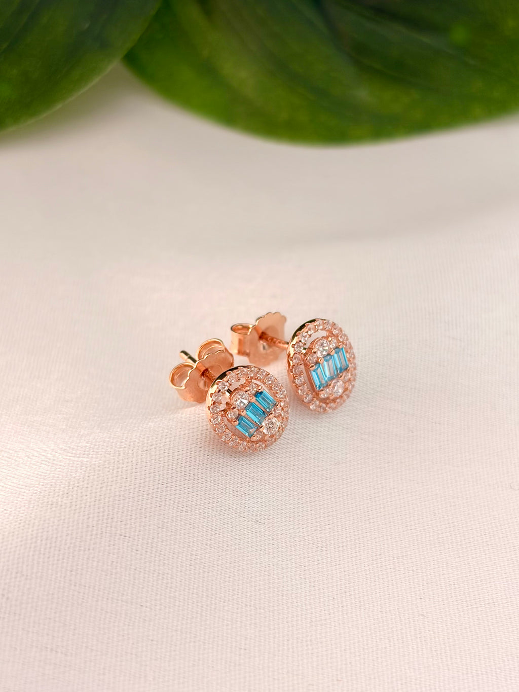 Elegant Blue Baguette Oval Halo Stud Earrings in Rose Gold Tone