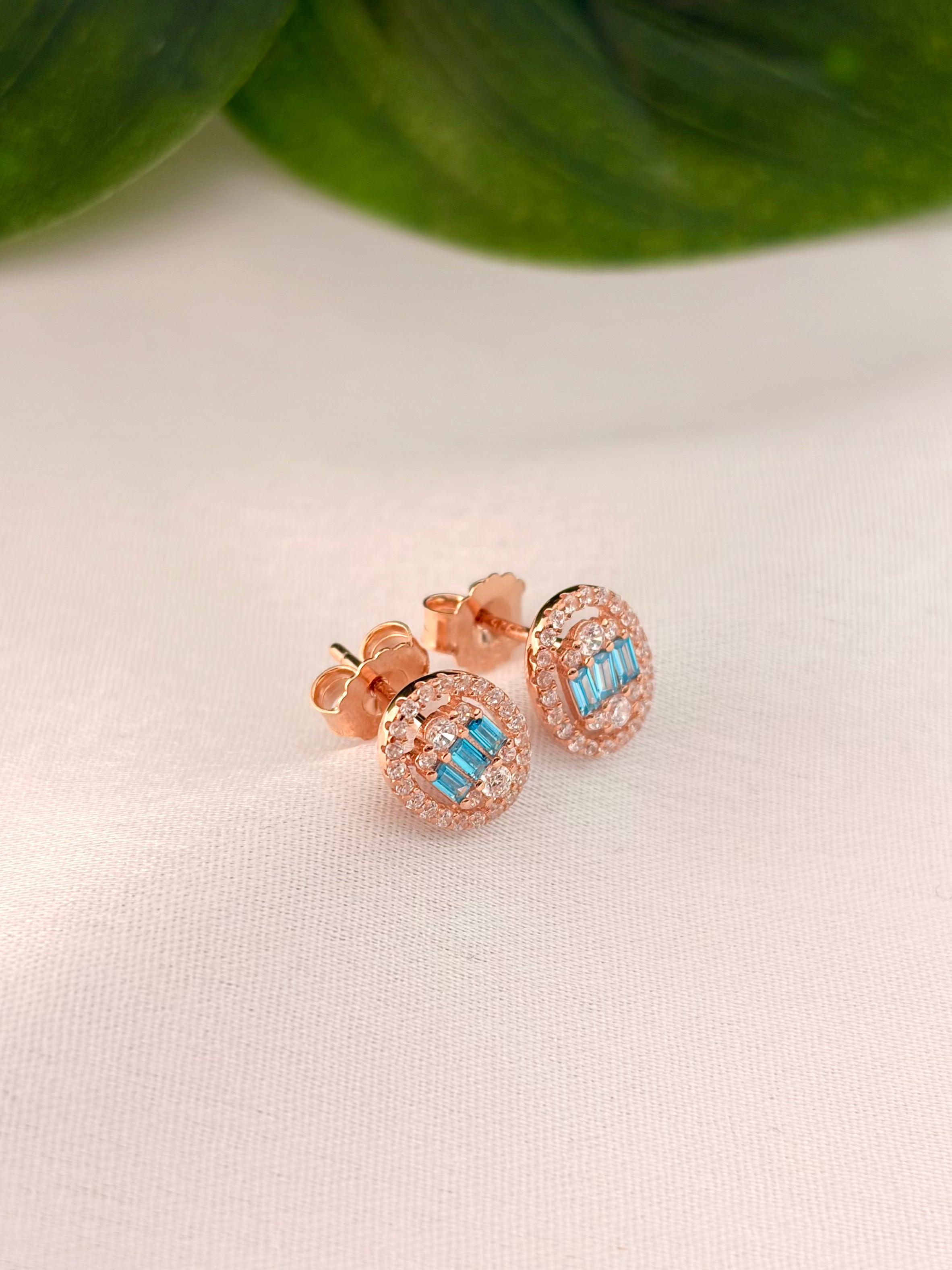 Elegant Blue Baguette Oval Halo Stud Earrings in Rose Gold Tone