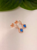 Elegant Blue Cushion-Cut Drop Earrings in Rose Gold Tone