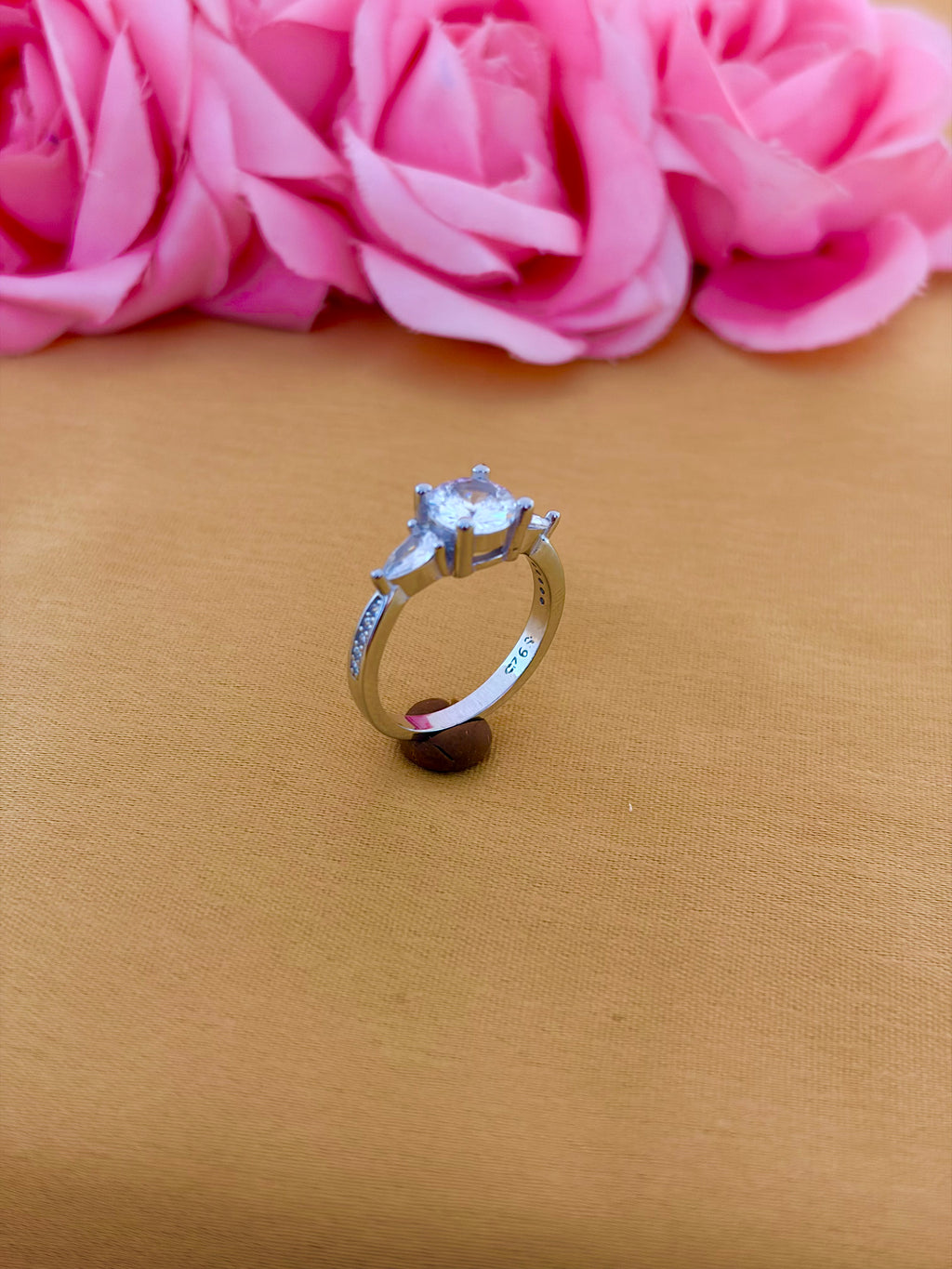 Raised Solitaire Side-Stone Ring