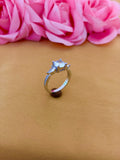 Raised Solitaire Side-Stone Ring