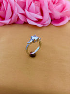 Raised Solitaire Side-Stone Ring