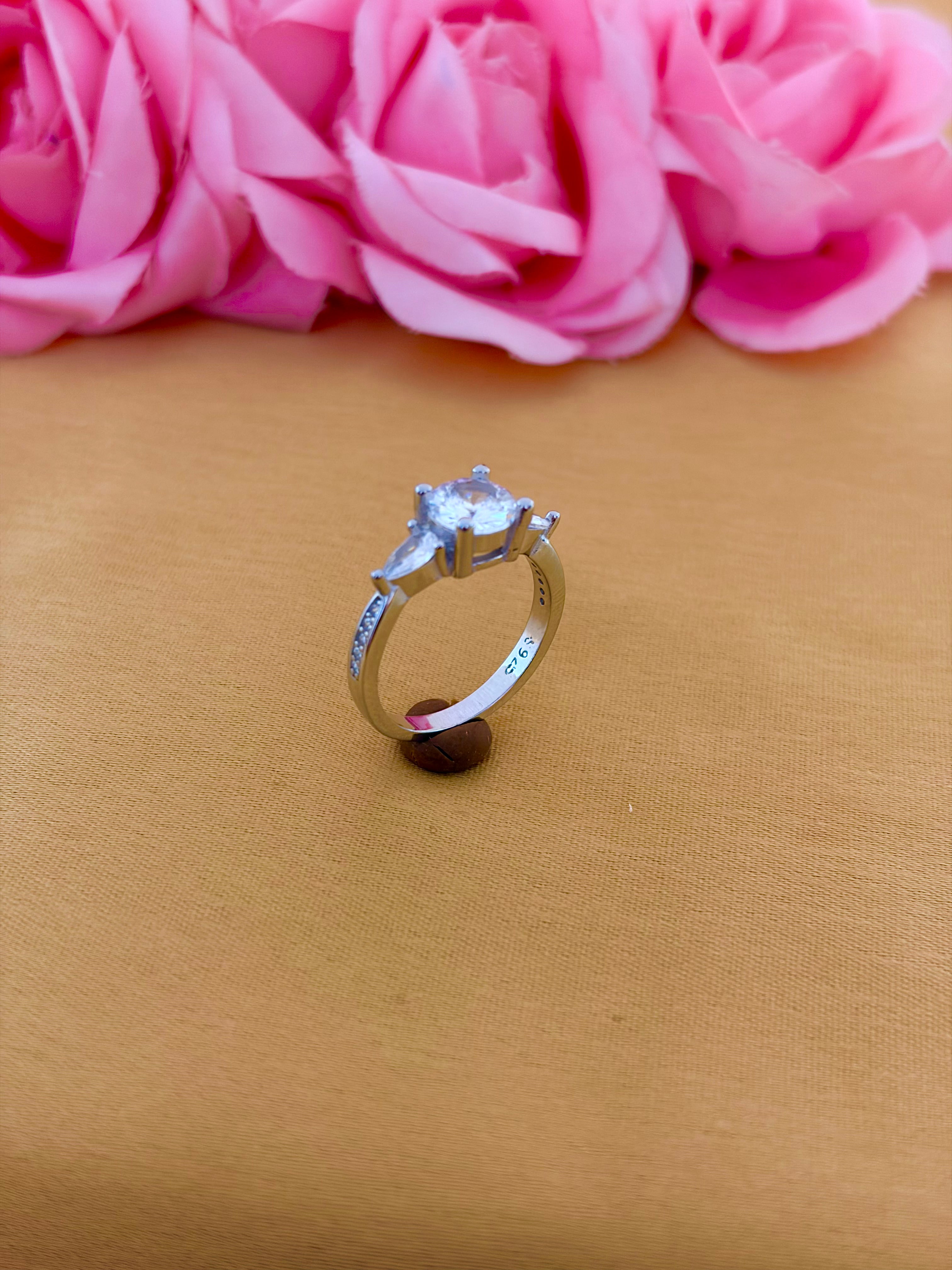 Raised Solitaire Side-Stone Ring