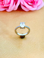 Classic Solitaire Oval Diamond Ring with Pavé Band