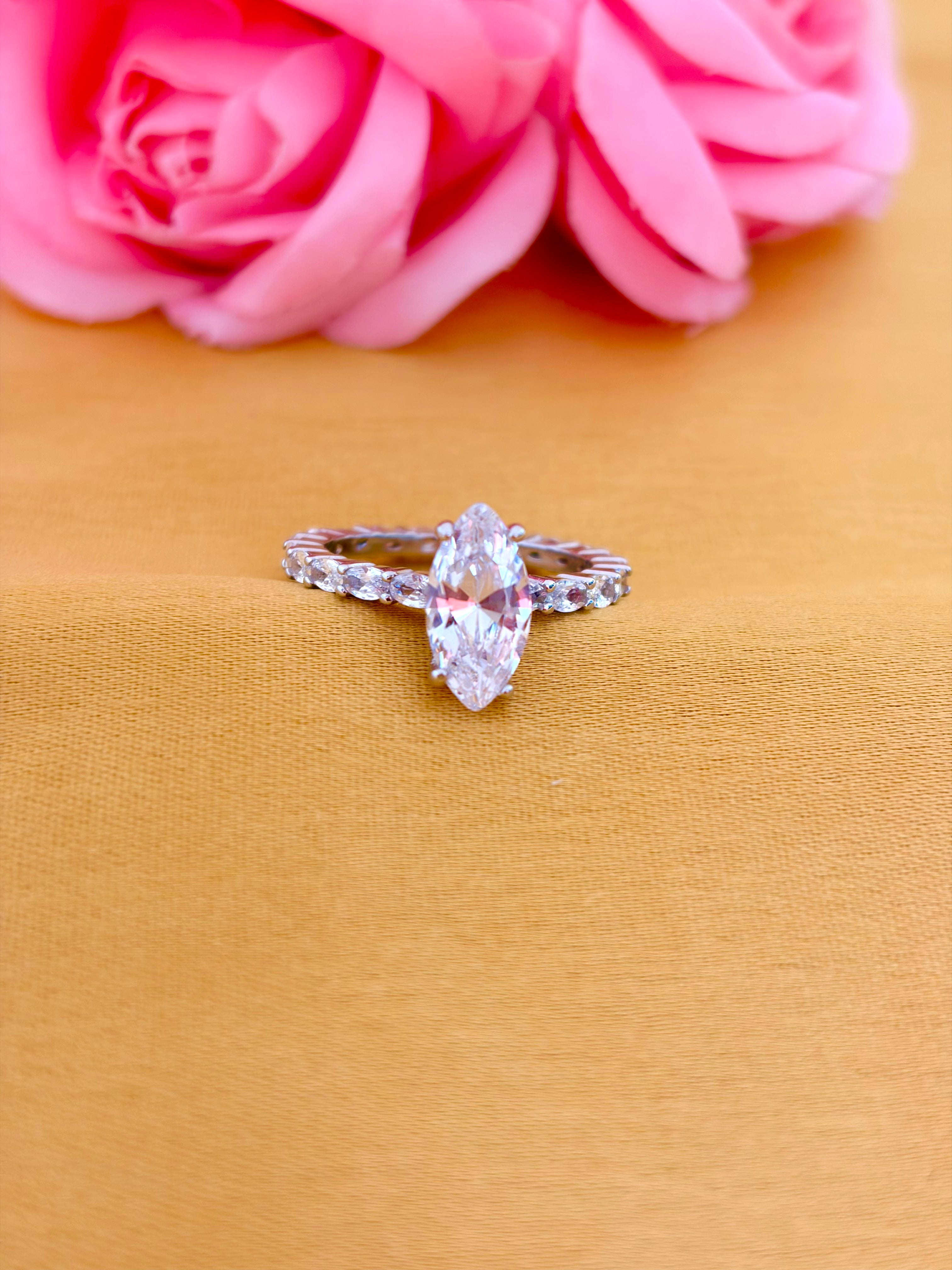 Elegant Marquise Solitaire Ring with Diamond Eternity Band