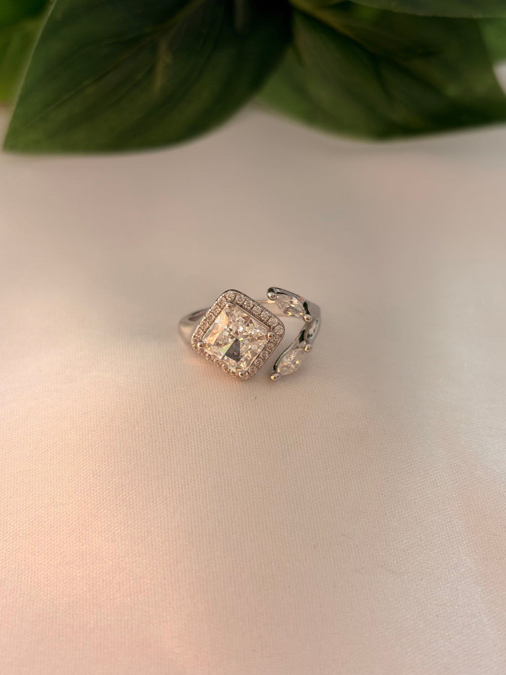 Elegant Cushion-Cut Halo Ring with Side Accents